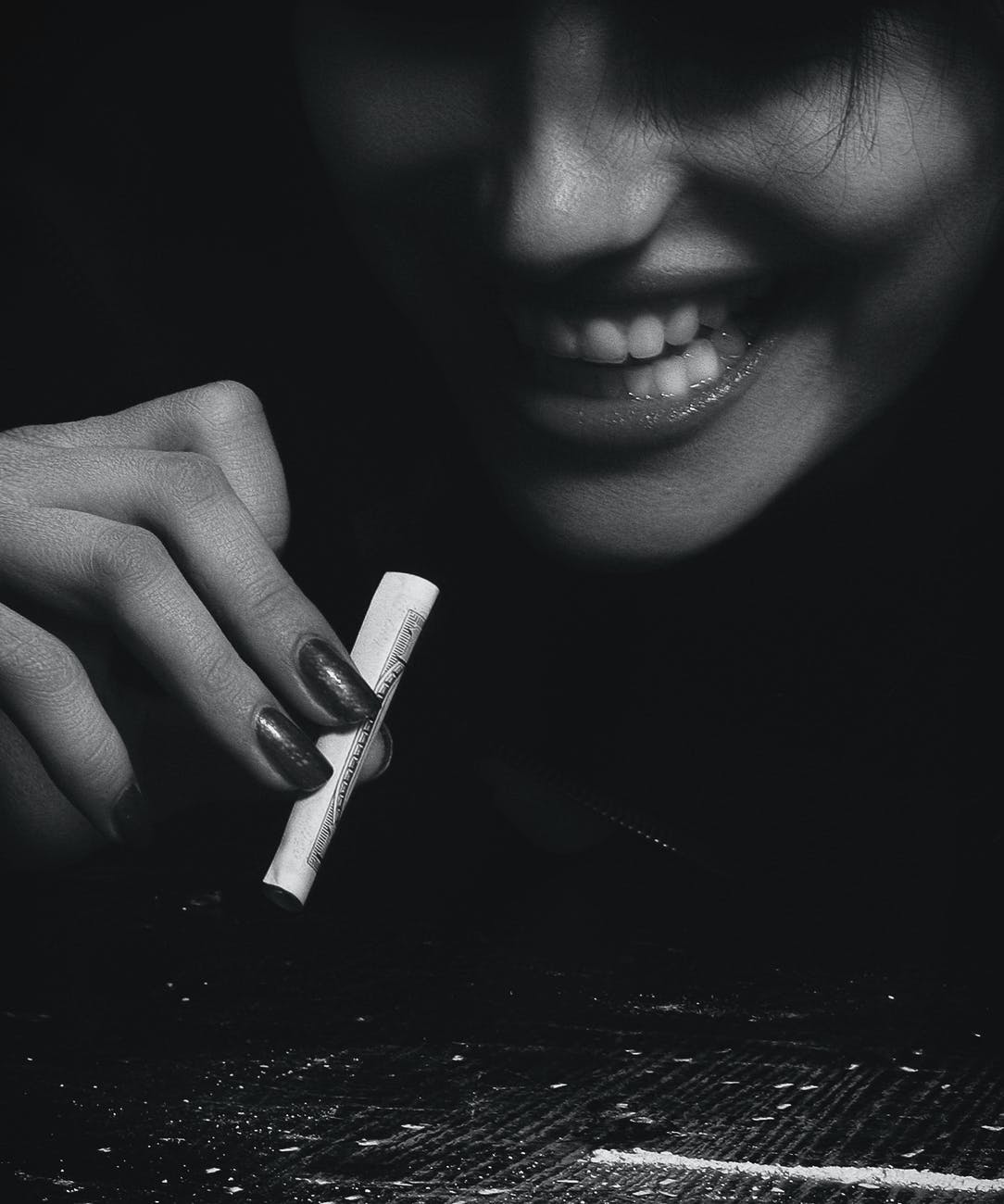 woman holding a blunt